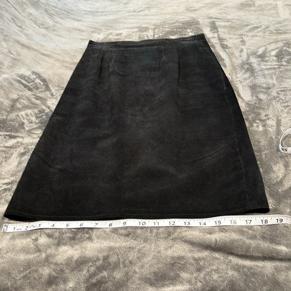 Dresses & Skirts - Vintage Leather skirt  size 8 fully lined color is black no call outs